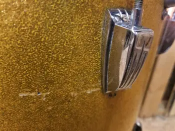 Repairing scratches in '60s Sparkle wrap (Ludwig)