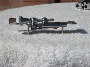A bent p83 strainer lever