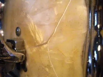 What causes cracking of Premier wrap?