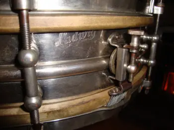 1918-1941 Ludwig Metal Snare with P-338 Strainer Dating Based On Catalogues.