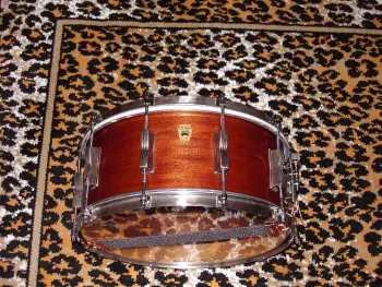 What is the definition of a real drum builder as opposed to a Drum assembler?