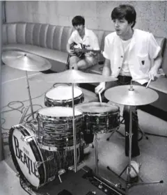 Came across this pic of Macca sitting at Ringo's drums