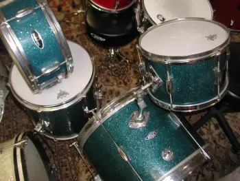 Looking for a hunk of MIJ aqua marine sparkle drum wrap