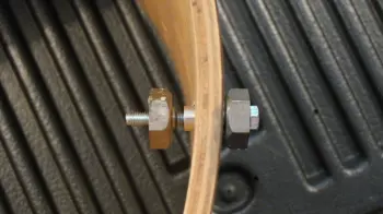 Re-installing badge grommet on 6-ply Ludwig…Need second opinion