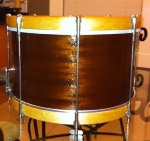 Calfskin heads and a drum badge