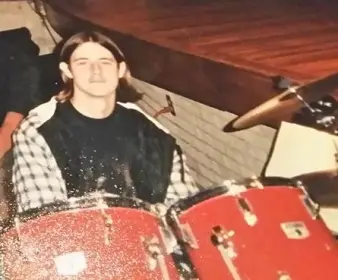 Oldest pic of you existing behind a set of drums.
