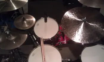 Where do you position your snare strainers?