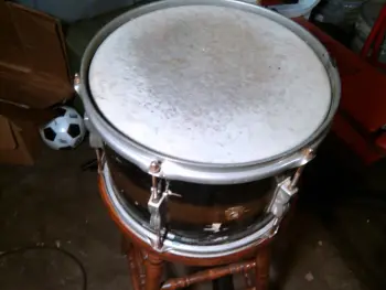 Pair of old drums in less than perfect shape