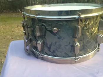 Ludwig engraved black beauty signature and Slingerland 1ply cloud badge snare