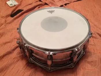How to tell Ludwig Lm 402 Steel from Chrome over Brass?