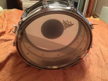 How to tell Ludwig Lm 402 Steel from Chrome over Brass?