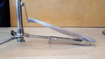Vintage Hi-hats with foot board over one of the legs