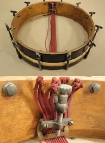 Cleaning up the shell of a 1908 Lyon Healy Single Head Snare