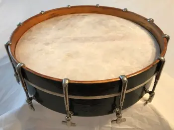 Cleaning up the shell of a 1908 Lyon Healy Single Head Snare