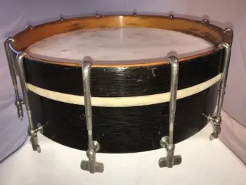 Cleaning up the shell of a 1908 Lyon Healy Single Head Snare