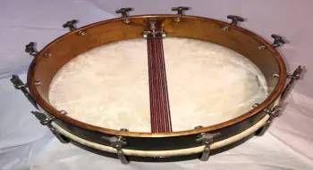 Cleaning up the shell of a 1908 Lyon Healy Single Head Snare