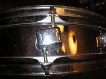 Tama metal piccolo offset snare lug needed.