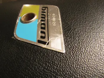 Sticking a loos badge down to the shell by Poppy