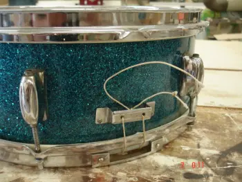Stewart snare throw off