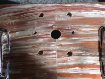 How much do extra holes in shell decrease value?