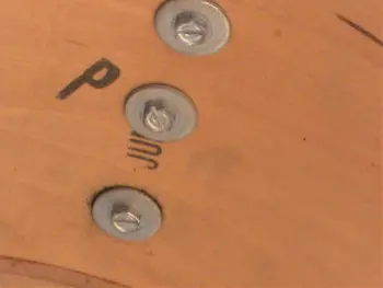 How much do extra holes in shell decrease value?