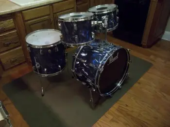 Pearl Wood/fibreglass Drum set information needed