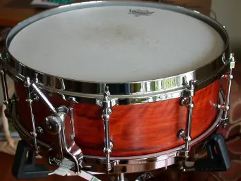 What is the definition of a real drum builder as opposed to a Drum assembler?