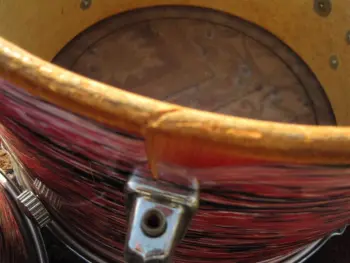 Pearl wood / fiberglass in red oyster