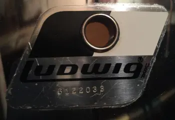Blue/Olive badges with L before the serial?