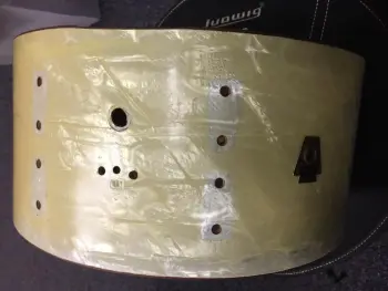 Transition badge snare strainer
